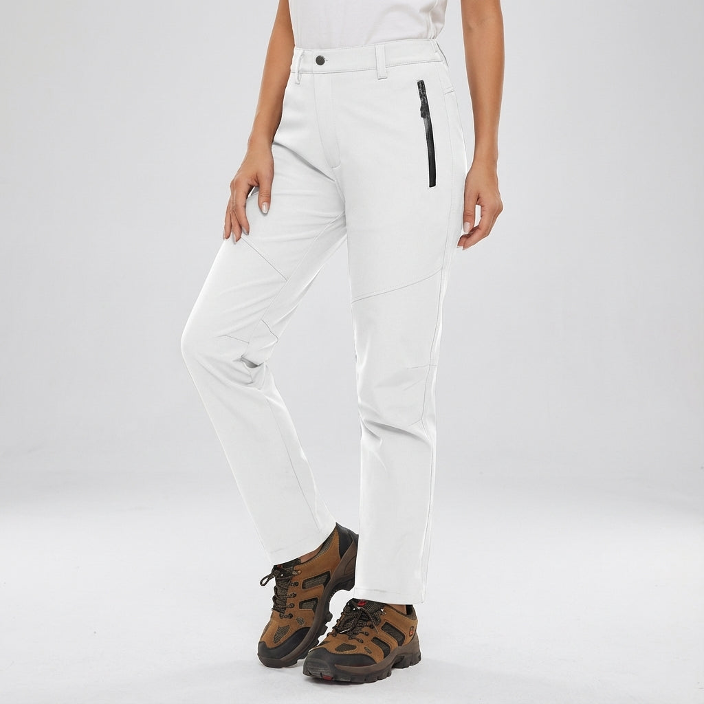 Fleece-lined Patricia outdoor pants for women. Waterproof & warm winter activewear, excellent for adventure.
