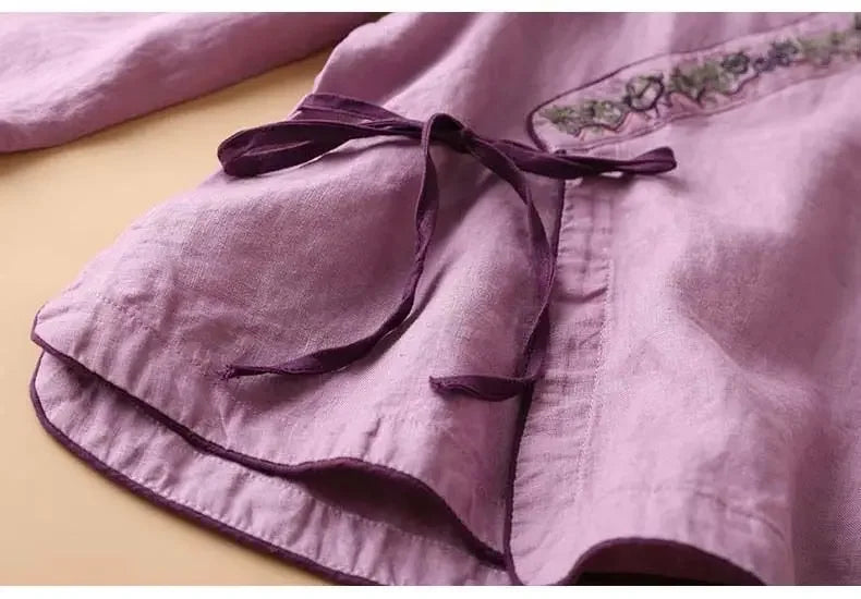 Relaxed fit women's patterned blouse, elegant V-neck. A comfortable & chic long sleeve top.