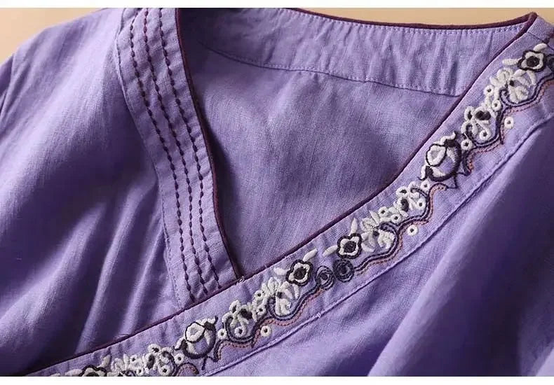 Pink patterned V-neck blouse, relaxed fit, long sleeve. Women's comfortable & chic top.
