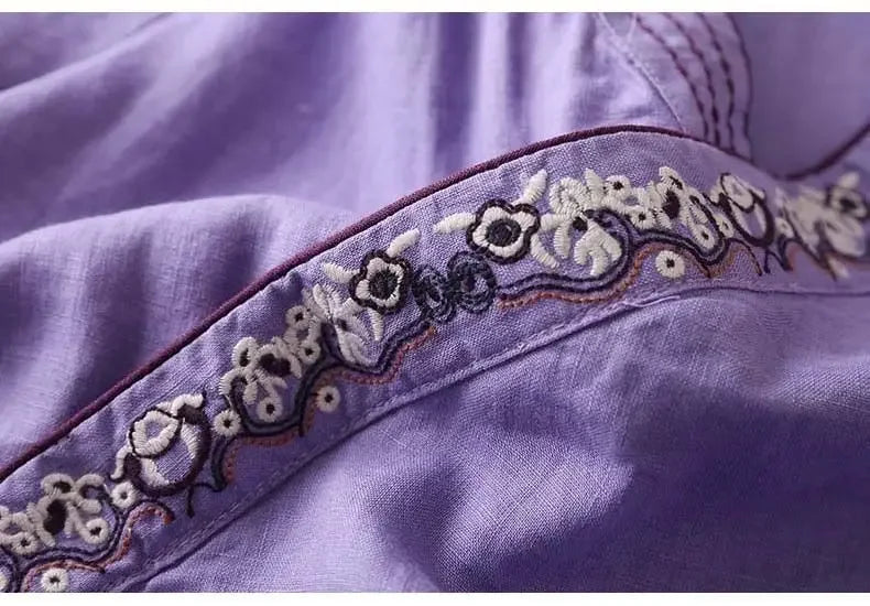 Women's long sleeve patterned blouse, relaxed fit V-neck. Elegant & comfortable for any occasion.