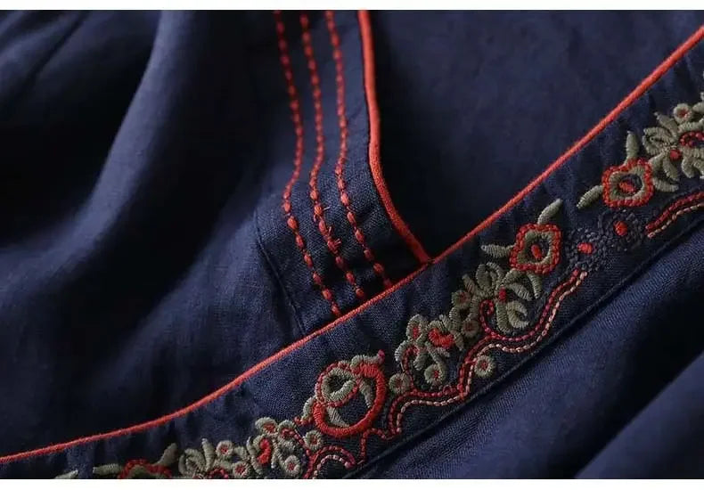 Embroidered red patterned women's blouse, relaxed fit, V-neck. Chic & comfortable.
