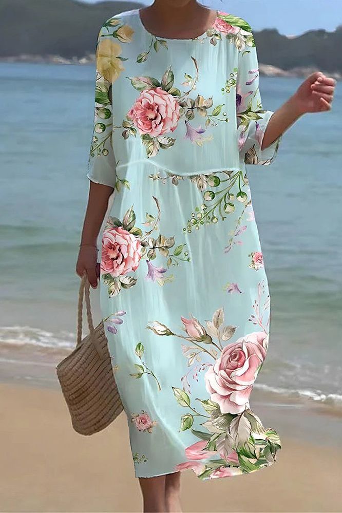 Women's patterned relaxed fit midi dress, perfect for casual summer wear and everyday comfort.