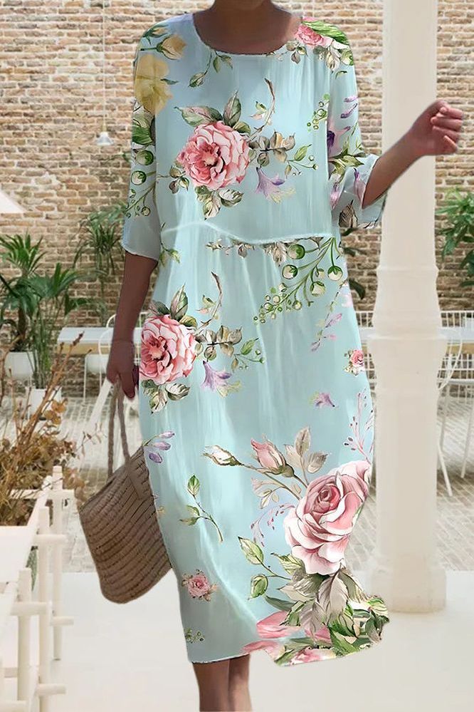 Comfortable women's midi dress with a vibrant print and relaxed fit, ideal for effortless everyday fashion.