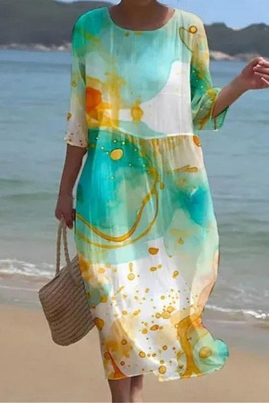 Casual women's summer midi dress featuring a beautiful print and relaxed, flowy design for ultimate comfort.