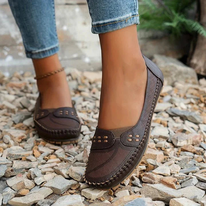 Comfortable & supportive women's perforated slip-on loafers, perfect for everyday casual wear.