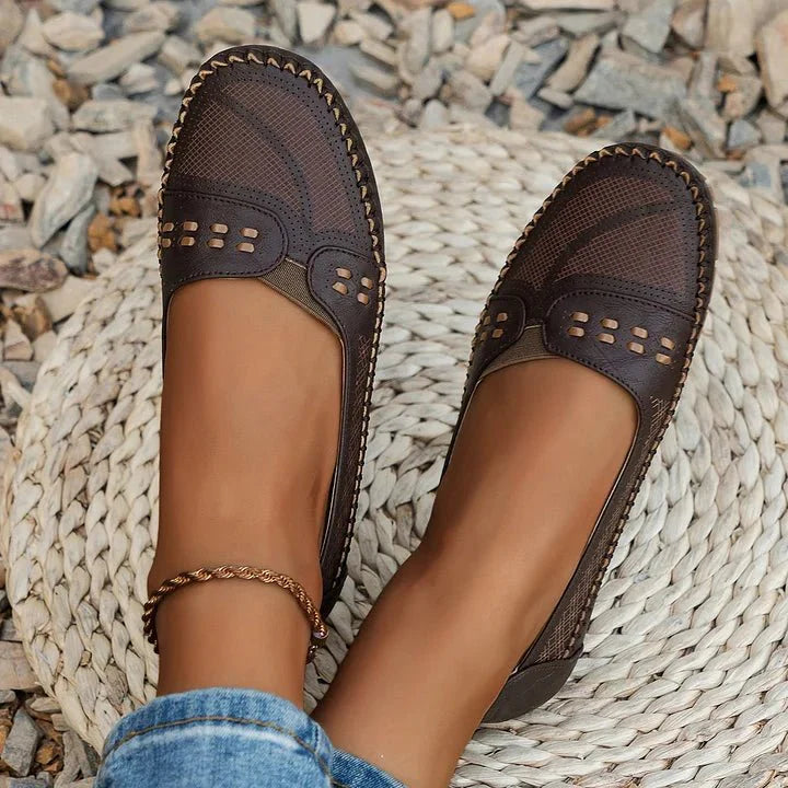Effortless women's slip-on loafers; orthopedic comfort with a stylish perforated design.