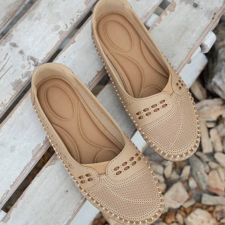 Easy slip-on perforated loafers for women, offering orthopedic support and casual style.