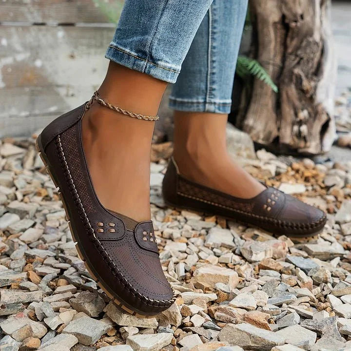 Casual women's orthopedic loafers, slip-on style with perforated upper for breathability.