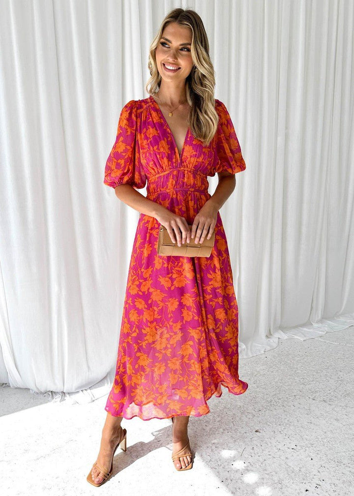Women's pink-orange floral V-neck maxi dress with puff sleeves, perfect for summer vacations & brunch.