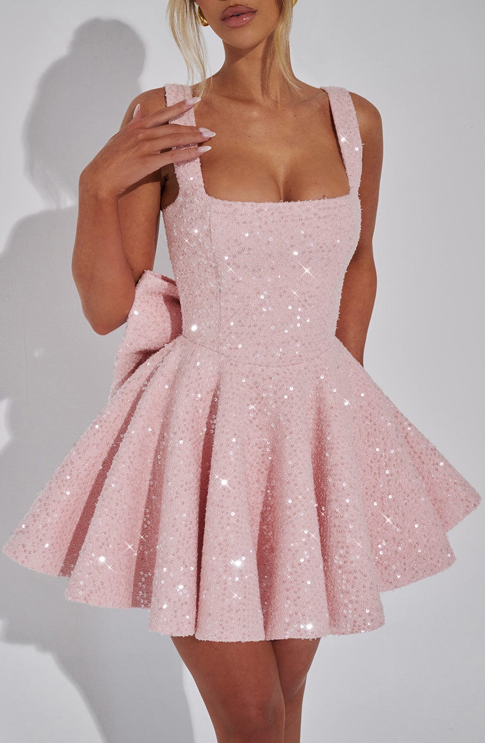 White formal sequin bow skater dress for women, ideal for homecoming, proms, or special evening events.
