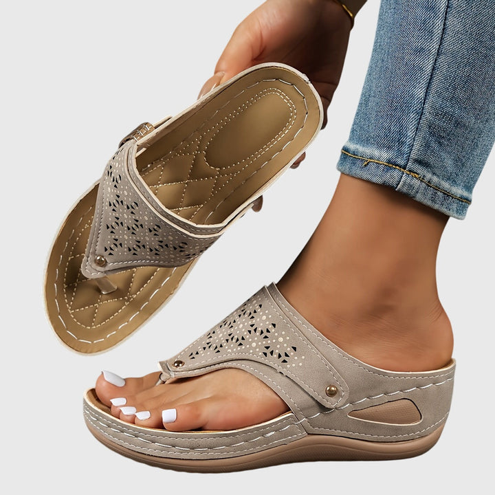 Women's platform ankle strap summer sandals. Comfortable open-toe chunky heels with elegant perforated design.