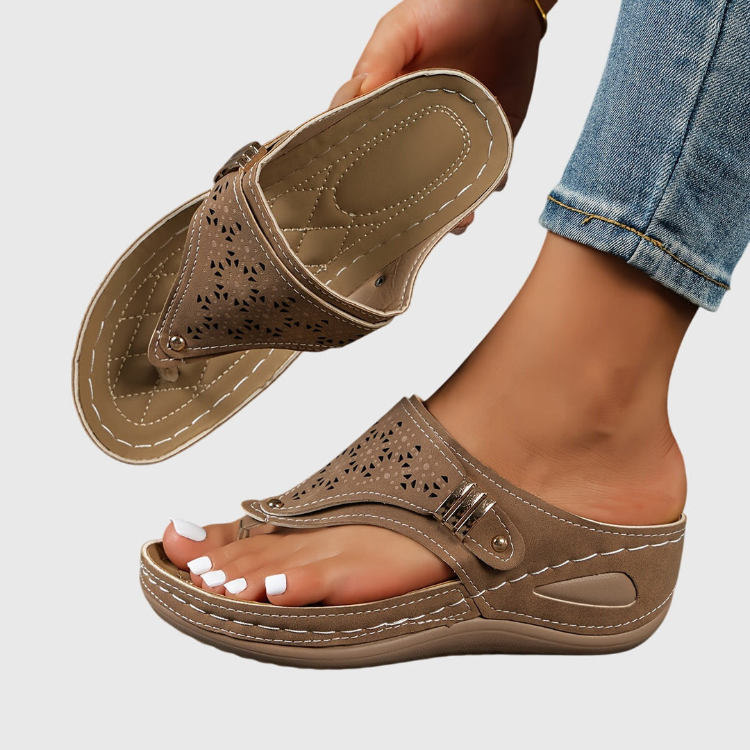 Elegant women's platform sandals with perforated design & ankle strap, perfect for summer events.