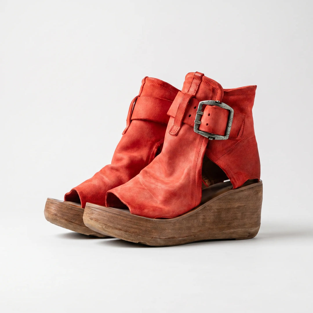 Comfortable women's wedge heel sandals with a sturdy platform and secure ankle strap for summer.