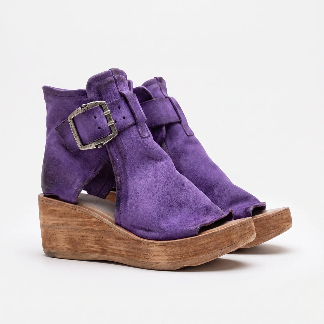 Women's summer platform wedge sandals with an adjustable ankle strap, great for sunny days.