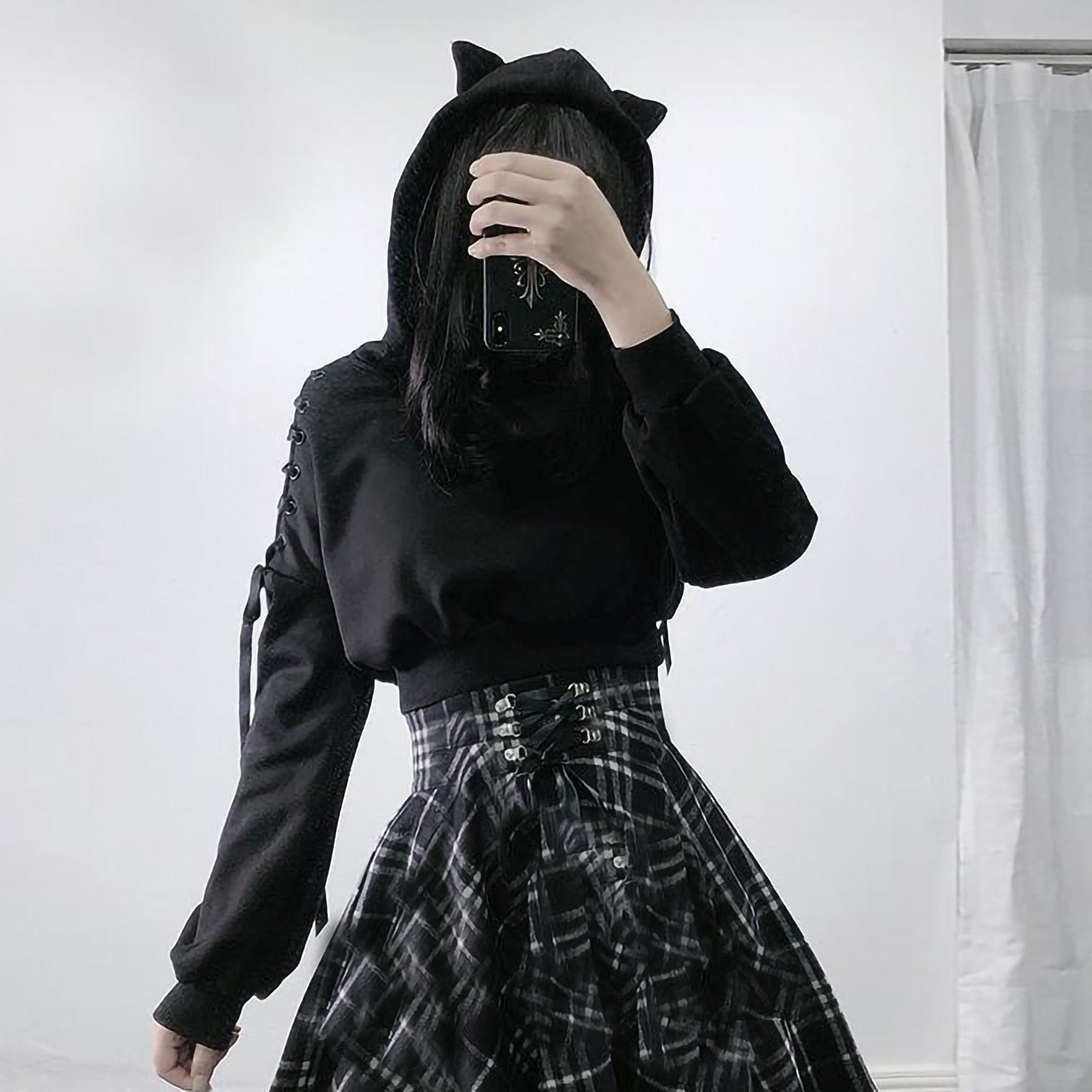 Cozy women's cropped hoodie featuring fun cat ears, a playful casual top for unique everyday style.