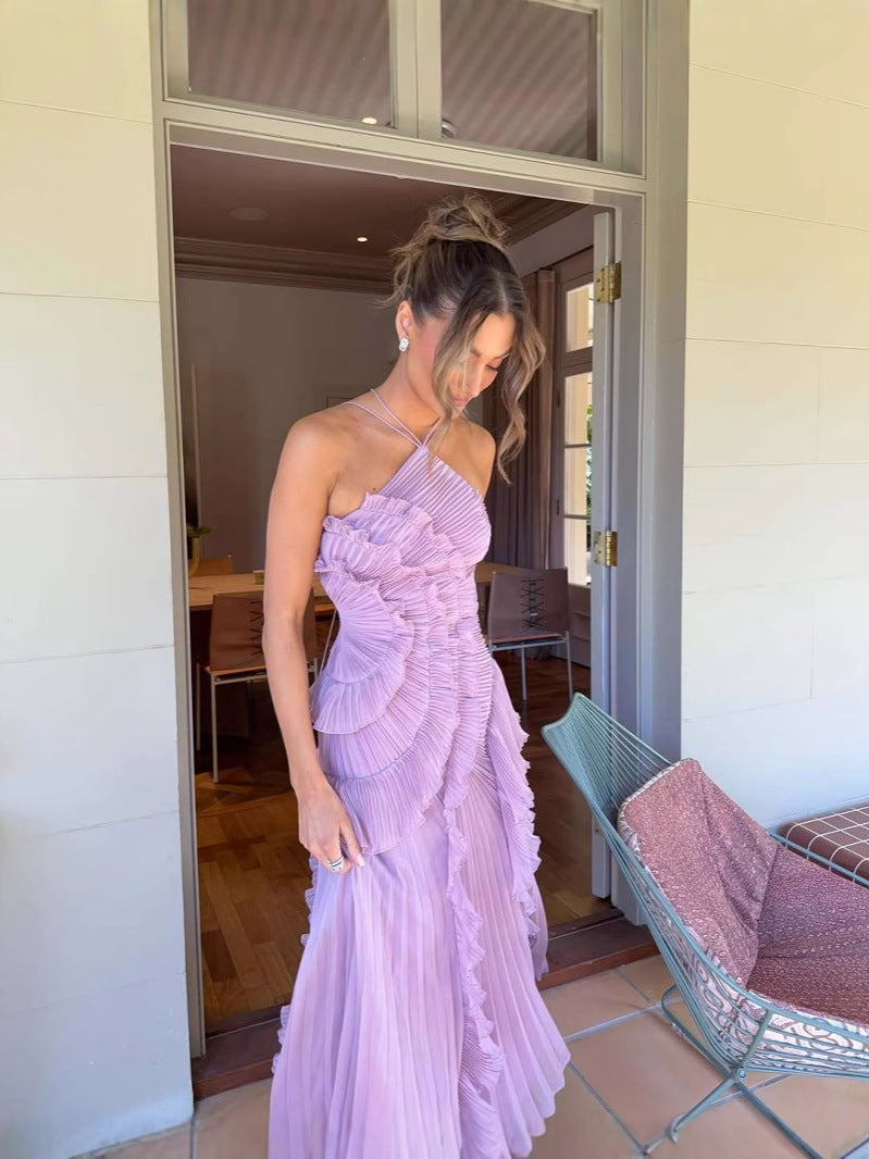 Lilac pleated ruffle halter midi dress for women, featuring a flowy skirt & sophisticated design.