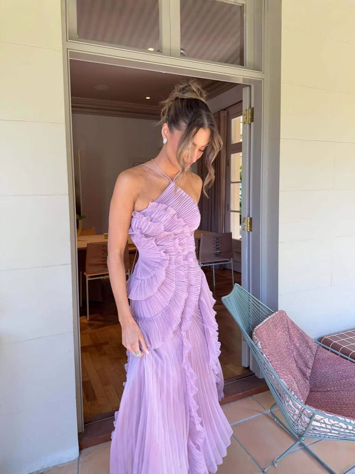 Lilac pleated ruffle halter midi dress for women, featuring a flowy skirt & sophisticated design.