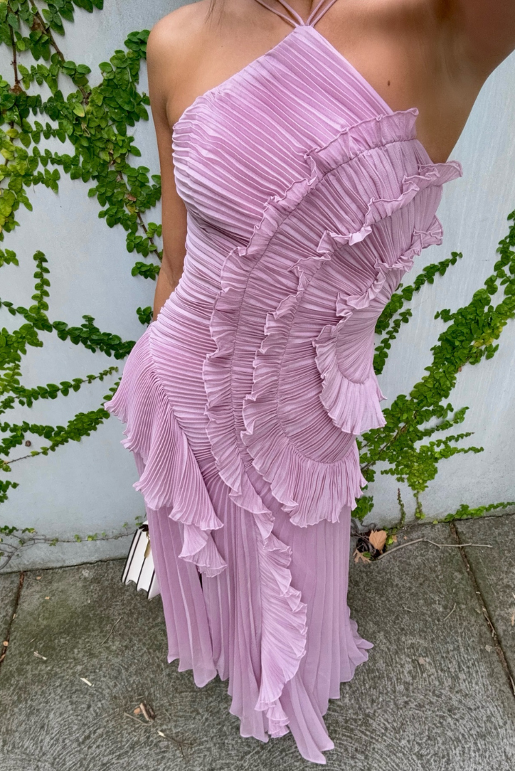 Elegant women's lilac pleated halter midi dress, suitable as a cocktail, wedding guest or special occasion gown.