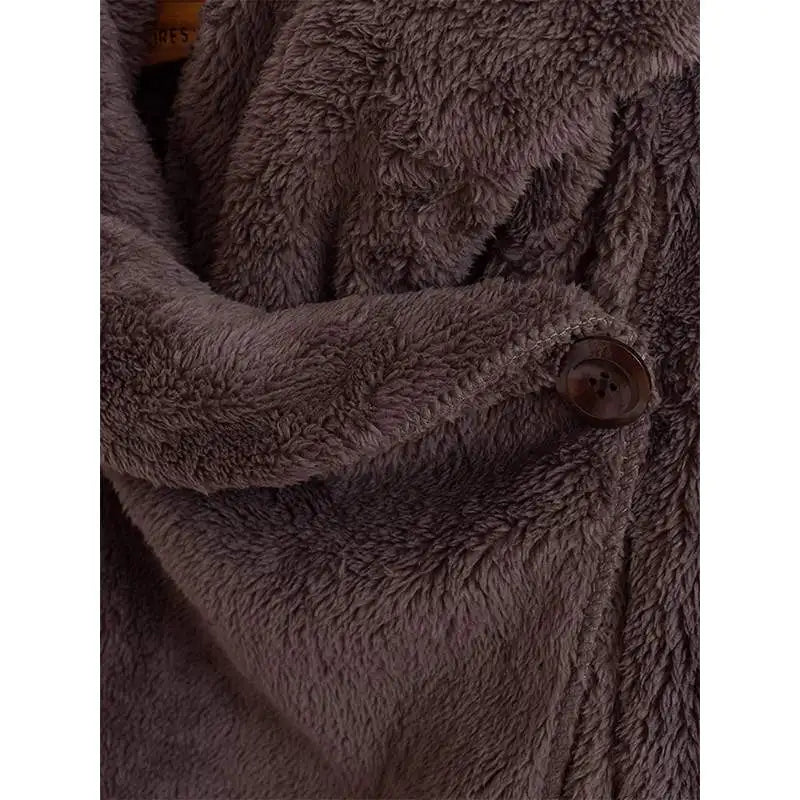 Fashionable plus-size women's hooded windbreaker. Cozy, oversized jacket offering style and comfort for all seasons.