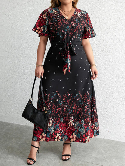 Women's plus size floral V-neck maxi dress with short sleeves, perfect for autumn casual wear.