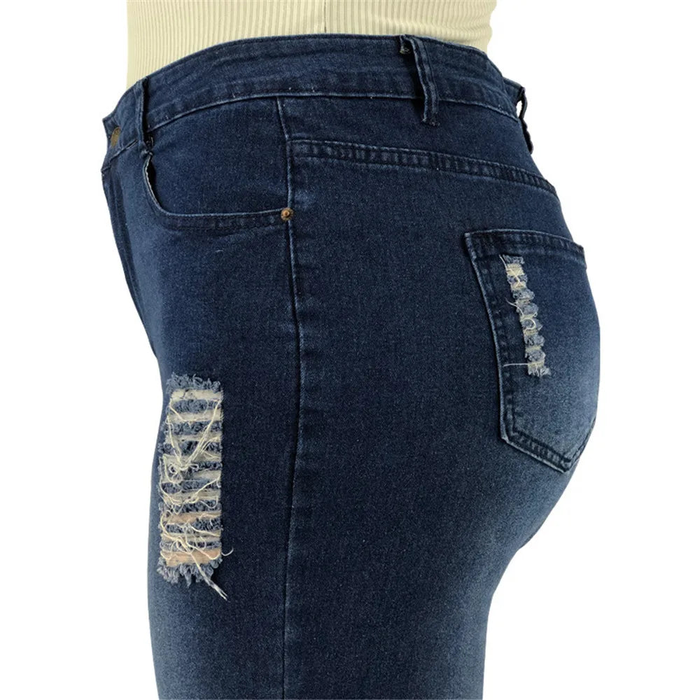 Women's plus size casual flared jeans, high-waist style with chic rips, comfortable stretch denim.