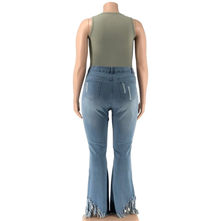 Trendy women's plus size high-waist ripped flared jeans, showcasing modern denim fashion.