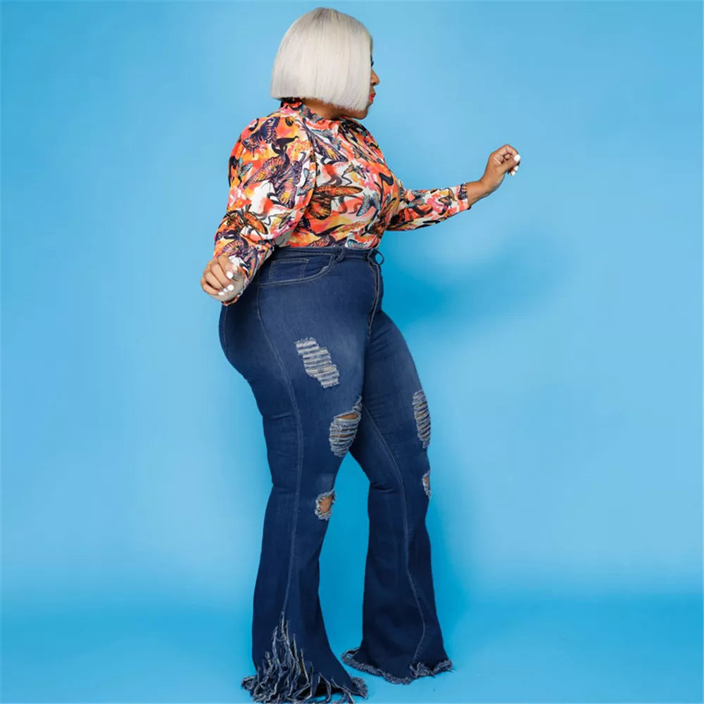 High-rise plus size ripped flared jeans, women's denim with stretch, ideal for all-year wear.
