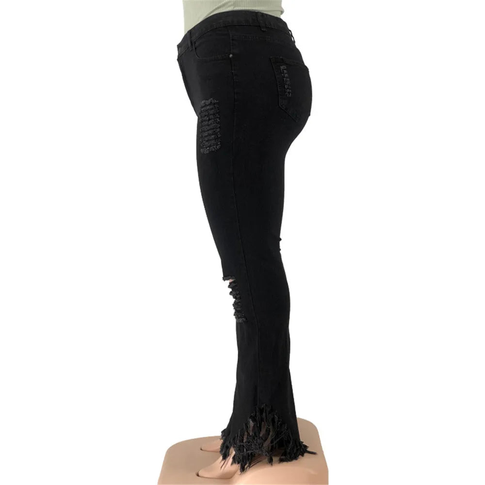 Plus size women's casual ripped flared jeans, high-waisted design, versatile stretch denim.