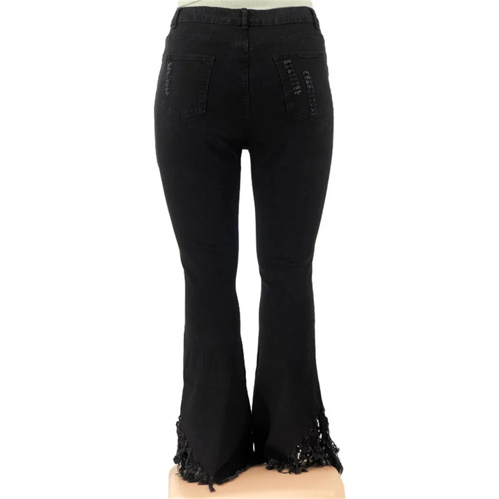 Trendy plus size high-waisted ripped flared jeans, women's essential denim for a chic look.