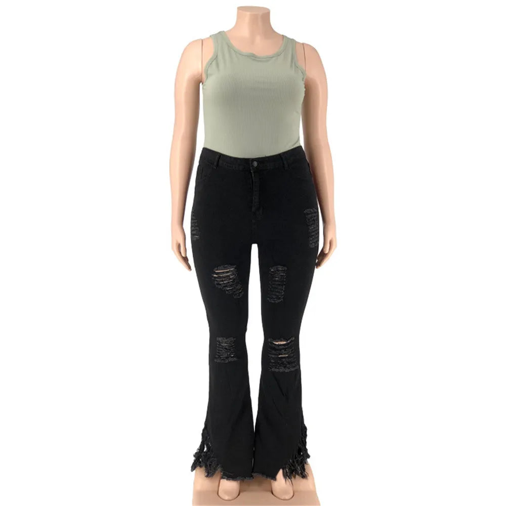 Plus size high-waist ripped flared jeans, women's trendy denim for comfort and effortless style.