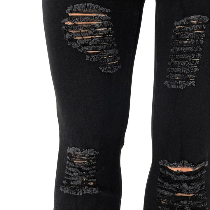 Plus size women's trendy flared jeans, high-waisted, ripped, and made from comfortable stretch denim.