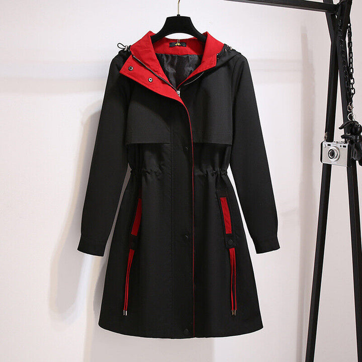 Women's plus size hooded windbreaker, perfect for transitional weather & casual style.