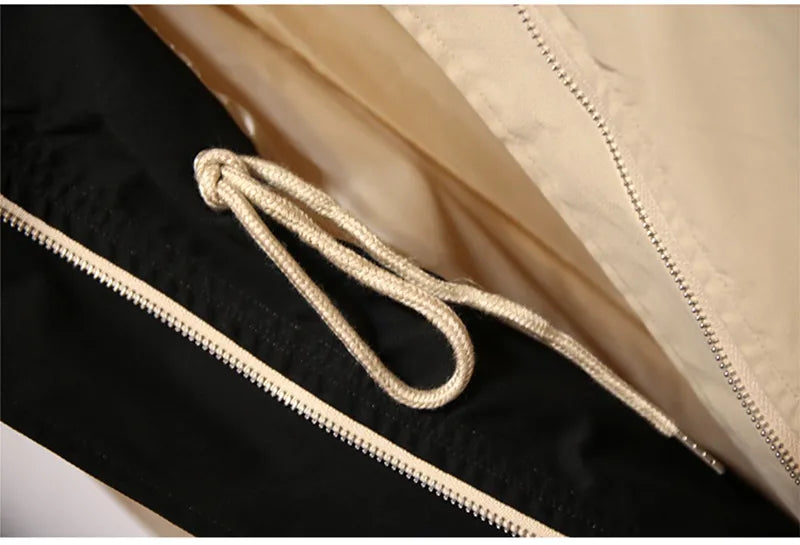 Comfortable & stylish plus size women's hooded windbreaker, great for casual outings & changing weather.