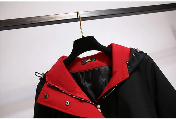 Plus size women's windbreaker, hooded and comfortable, essential outerwear for changing seasons.