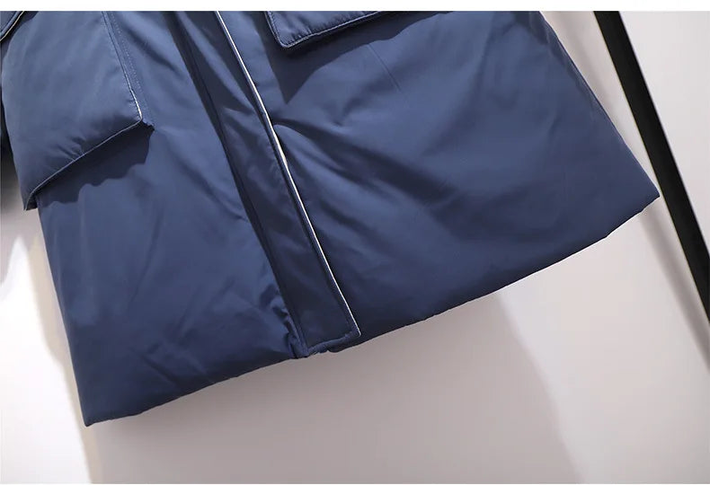 Cozy plus-size women's padded winter jacket, long design with hood, perfect for cold days.