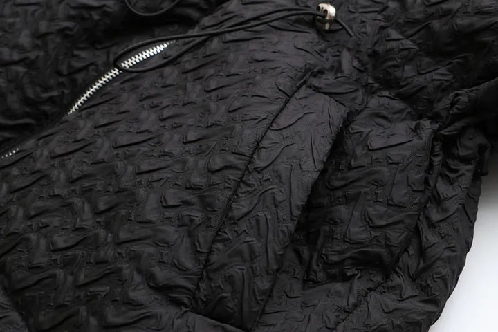 Stylish women's plus-size puffer outerwear, mid-length.