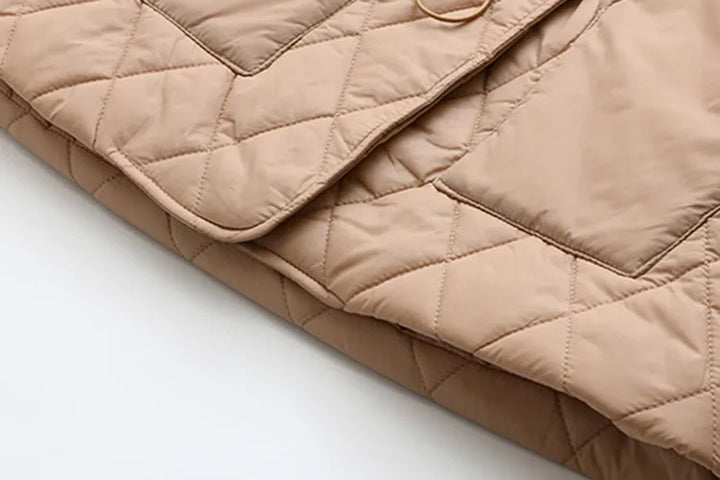 Flattering plus size padded jacket for women, autumn leaf print. Ideal fall fashion.