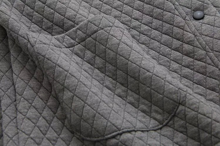Stylish fall women's plus-size plaid cardigan, cozy and chic fashion apparel.