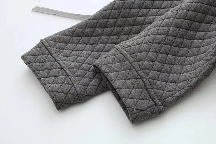 Cozy women's plus-size plaid cardigan, fall fashion outerwear with elegant style.