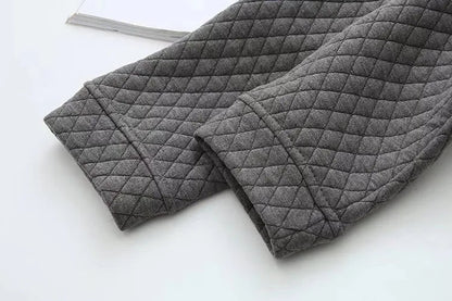 Cozy women's plus-size plaid cardigan, fall fashion outerwear with elegant style.