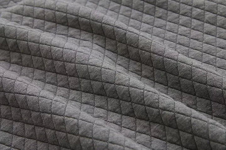 Women's plus-size plaid sweater, a chic and cozy addition to any fall fashion wardrobe.