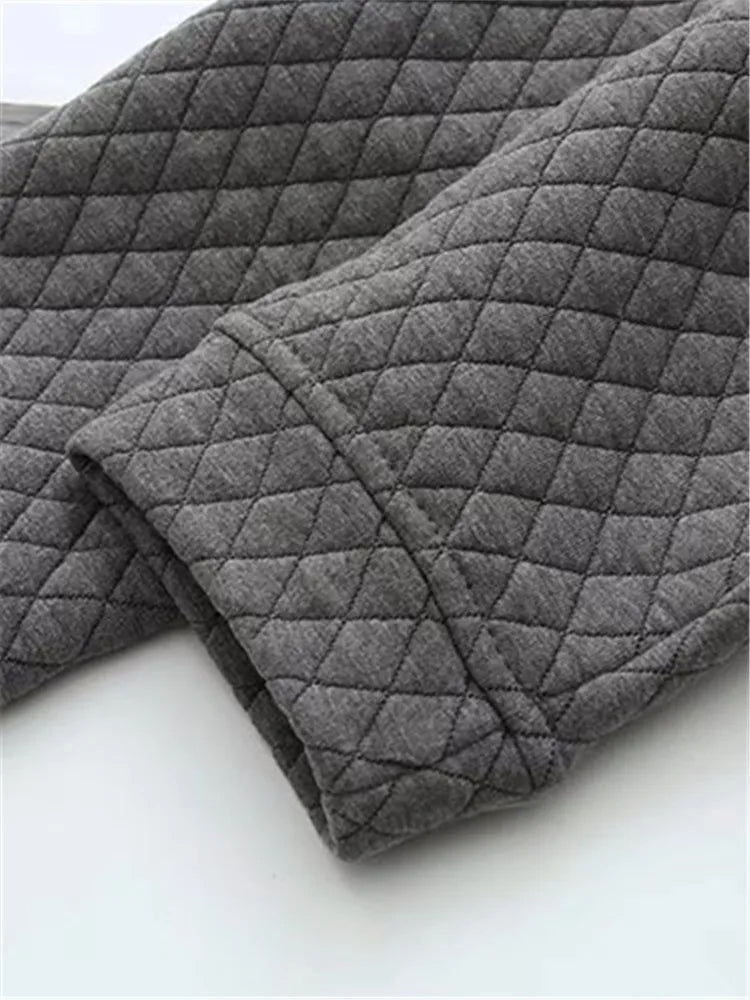 Chic women's plus-size plaid sweater, long sleeve comfort, perfect for versatile layering.
