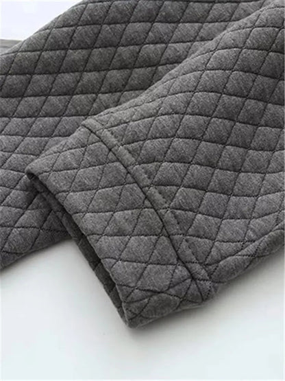 Chic women's plus-size plaid sweater, long sleeve comfort, perfect for versatile layering.
