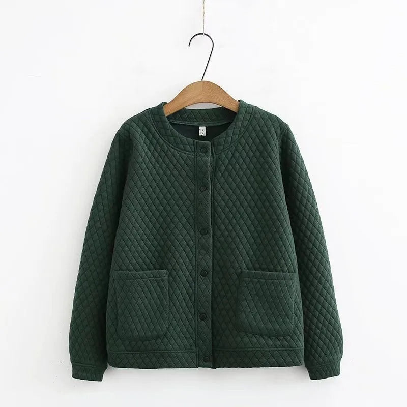 Stylish women's plus-size plaid sweater, ideal for cozy fall fashion & everyday comfort.