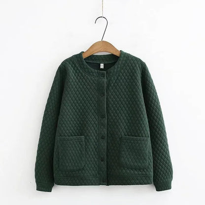 Stylish women's plus-size plaid sweater, ideal for cozy fall fashion & everyday comfort.
