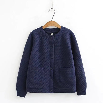 Chic plus-size plaid cardigan for women, a versatile piece of cozy outerwear apparel.