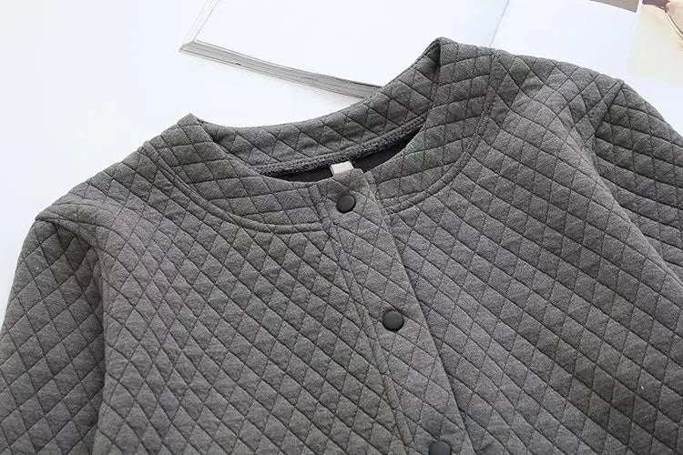 Elegant plus-size plaid cardigan, women's apparel for stylish and comfortable layering.