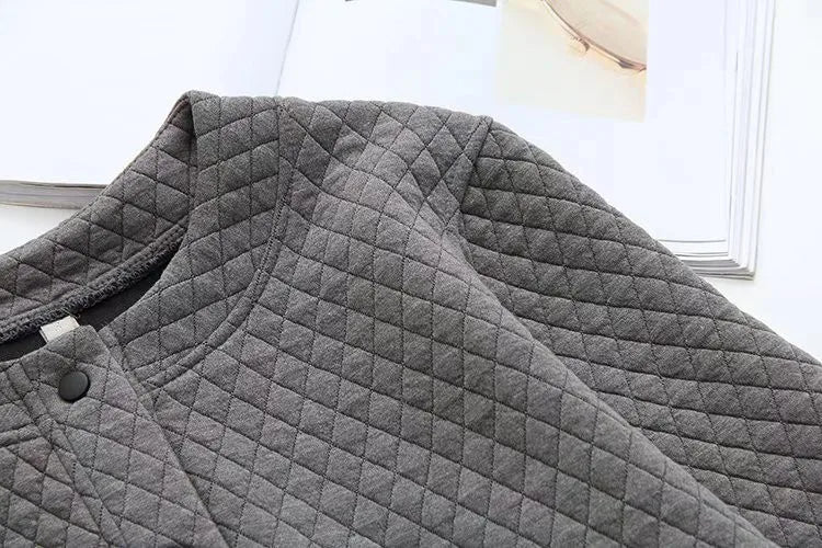 Versatile women's plus-size plaid sweater, long sleeve comfort for all-year fashion.