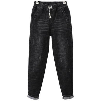 Comfortable women's plus size baggy jeans. High-waisted, stretch denim for a relaxed, all-year fashion bottom.