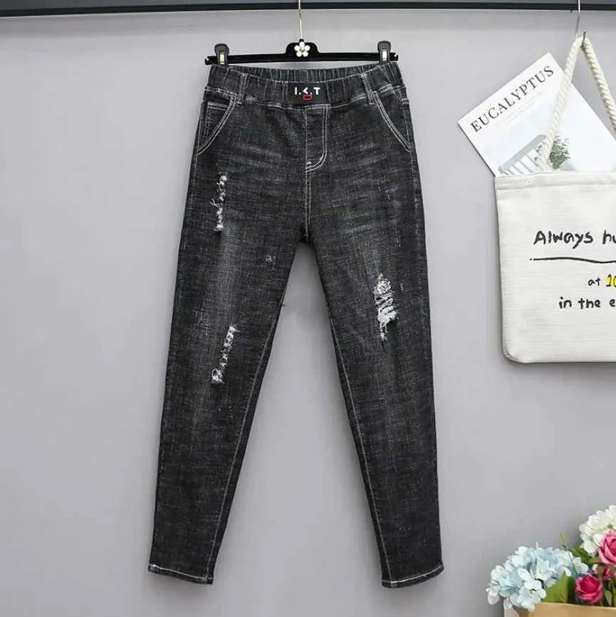 Front view of women's plus size high-waisted baggy jeans, featuring a relaxed fit and stretch denim.